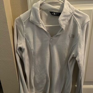 White pull over Northface.